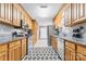 Kitchen with stainless steel appliances and light oak cabinets at 135 Rumple Hill Dr, Statesville, NC 28677