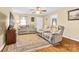 Bright living room with hardwood floors and comfortable seating at 135 Rumple Hill Dr, Statesville, NC 28677