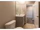 Bathroom with toilet, vanity, and access to another room at 138 Gray Willow St, Mooresville, NC 28117