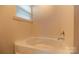 Relaxing bathroom with soaking tub and shower at 138 Gray Willow St, Mooresville, NC 28117