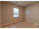 Simple bedroom with neutral walls and carpet at 138 Gray Willow St, Mooresville, NC 28117