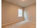 Well-lit bedroom featuring neutral walls and carpet at 138 Gray Willow St, Mooresville, NC 28117