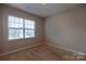 Bright bedroom with neutral walls and carpet at 138 Gray Willow St, Mooresville, NC 28117