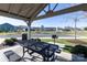 Community picnic shelter with grill and table provides a great space to gather outdoors at 138 Gray Willow St, Mooresville, NC 28117