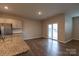 Bright dining area with hardwood floors and sliding glass doors at 138 Gray Willow St, Mooresville, NC 28117