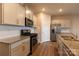 Modern kitchen with granite countertops and stainless steel appliances at 138 Gray Willow St, Mooresville, NC 28117