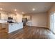 Open concept kitchen, featuring stainless steel appliances and hardwood floors at 138 Gray Willow St, Mooresville, NC 28117