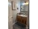 Bathroom with wood cabinets and a vessel sink at 158 White Rd, Wadesboro, NC 28170