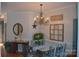 Dining room featuring a chandelier and decorative wall accents at 158 White Rd, Wadesboro, NC 28170