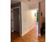 Simple hallway with light walls and wood floors at 158 White Rd, Wadesboro, NC 28170