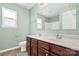 Bathroom with double vanity and light green walls at 160 Millen Dr, Mooresville, NC 28115