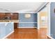 Light and airy dining area with hardwood floors and neutral walls at 160 Millen Dr, Mooresville, NC 28115