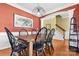 Bright dining room features a wood table with black chairs and a statement light fixture at 160 Millen Dr, Mooresville, NC 28115