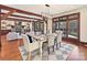 Bright dining room with hardwood floors and a view to the living room at 19100 Mary Ardrey Cir, Cornelius, NC 28031