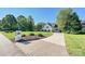 Circular driveway leading to a charming two-story home at 19100 Mary Ardrey Cir, Cornelius, NC 28031