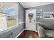 Bright and airy entryway with hardwood floors and stained glass door at 303 Knox St, Clover, SC 29710