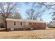 A charming single story home featuring brick and vinyl siding, complemented by a neatly landscaped yard at 440 Providence Rd, Lancaster, SC 29720