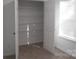 Spacious bedroom closet with wire shelving at 8027 Bristle Ln, Charlotte, NC 28214