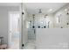 Spa-like bathroom with a large walk-in shower at 8478 Rocky River Rd, Harrisburg, NC 28075