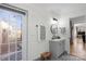 Modern bathroom with gray vanity, white shiplap walls, and a walk-in shower at 8478 Rocky River Rd, Harrisburg, NC 28075