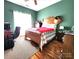 Bedroom with hardwood floors and antique bed at 901 Huntington Hills Dr, Lincolnton, NC 28092