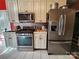 Kitchen with stainless steel appliances and light cabinets at 901 Huntington Hills Dr, Lincolnton, NC 28092