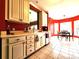 Eat-in kitchen with red walls and white cabinets at 901 Huntington Hills Dr, Lincolnton, NC 28092