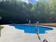 Inviting in-ground swimming pool, perfect for summer fun at 901 Huntington Hills Dr, Lincolnton, NC 28092