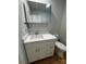 Bathroom featuring a single sink vanity with quartz countertop, toilet, and medicine cabinet at 112 Mccray Ave, Kannapolis, NC 28081