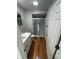 Bathroom featuring a glass shower, wood-look floors, and a single sink vanity at 112 Mccray Ave, Kannapolis, NC 28081