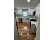 Renovated kitchen features updated stainless steel appliances, and hardwood floors at 112 Mccray Ave, Kannapolis, NC 28081