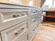 Gray kitchen island with stainless steel drawer pulls at 13612 Robert Walker Dr, Davidson, NC 28036