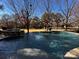 Expansive pool with hot tub overlooking golf course at 13612 Robert Walker Dr, Davidson, NC 28036