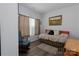 Bedroom with daybed, rocking chair, and window at 112 Canina Ln, Indian Trail, NC 28079