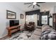 Living room with a gray couch, brown recliner, and rustic wooden coffee table at 112 Canina Ln, Indian Trail, NC 28079