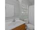 Clean bathroom with single sink vanity, toilet and shower/tub at 116 E Maryland Ave, Bessemer City, NC 28016