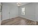 Simple dining area with hardwood floors and light walls at 116 E Maryland Ave, Bessemer City, NC 28016