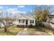 Tan house with small front porch and yard at 116 E Maryland Ave, Bessemer City, NC 28016