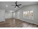 Bright living room featuring hardwood floors and large window at 116 E Maryland Ave, Bessemer City, NC 28016