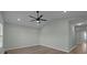 Spacious living room with vaulted ceiling and hardwood floors at 116 E Maryland Ave, Bessemer City, NC 28016