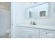 Clean bathroom with white vanity and large mirror at 1220 Lomax Ave, Charlotte, NC 28211