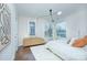 Bright bedroom with hardwood floors and large windows at 1220 Lomax Ave, Charlotte, NC 28211