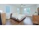 Spacious bedroom with hardwood floors and large windows at 1220 Lomax Ave, Charlotte, NC 28211