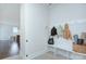 Clean and functional entryway with storage bench and hooks for backpacks at 1220 Lomax Ave, Charlotte, NC 28211