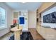 Modern home office with built-in shelving and desk at 1220 Lomax Ave, Charlotte, NC 28211