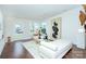 Bright living room featuring hardwood floors and modern decor at 1220 Lomax Ave, Charlotte, NC 28211