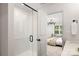 Elegant bathroom with marble shower and access to bedroom at 13114 Blacksmith Ct, Matthews, NC 28105