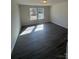 Bright bedroom featuring wood floors, natural light, and fresh paint at 1608 Cole St, Gastonia, NC 28054