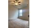 Spacious bedroom with ceiling fan and window at 1608 Cole St, Gastonia, NC 28054