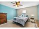 Bedroom with ceiling fan and blue accent wall at 1976 Mcilwain Rd, Lancaster, SC 29720